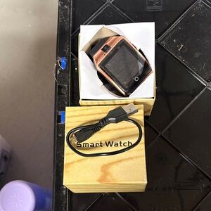 Smart Watch with Black and Gold Design brand new never used in box